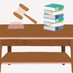 A gavel and a stack of law textbooks refer to ADA violations.