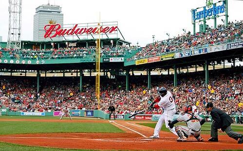 Alt text for an image reads: David Ortiz of the Boston Red Sox batting from home plate at Fenway Park